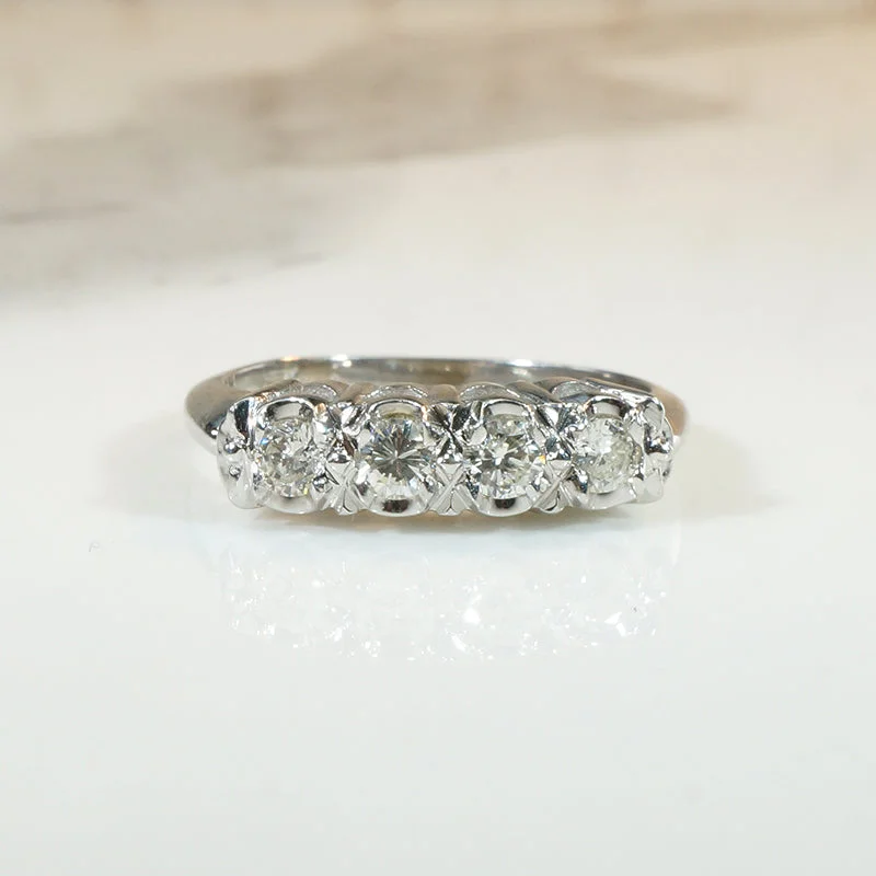 Women’s radiant cut engagement rings-Four Sparkling Diamonds in Curvy White Gold Band