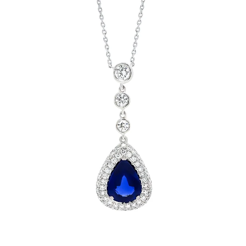 Women’s floral necklaces-Platinum Sapphire and Diamond Halo Pendant