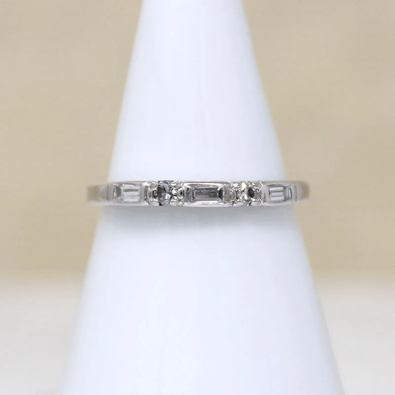 Women’s timeless engagement rings-Refined Baguette & Round Diamond Platinum Band