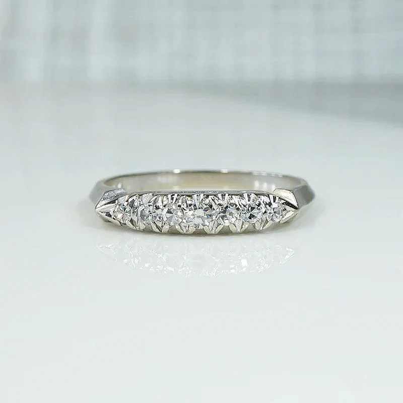 Women’s custom engagement rings-Retro White Gold Band with Seven Bright Diamonds