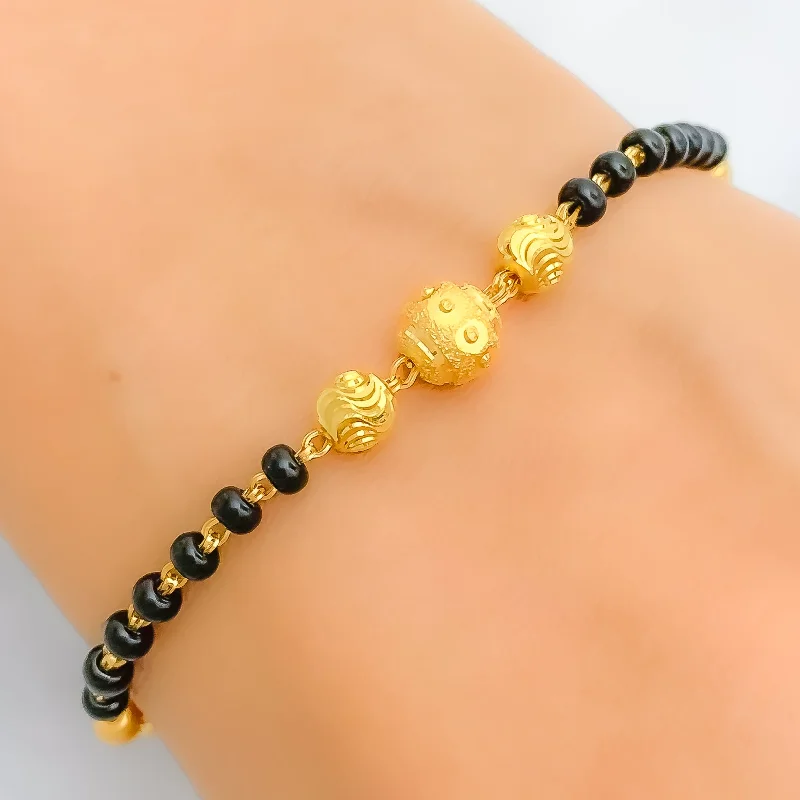 Women’s handmade bracelet-Women’s big statement bracelets-Triple Orb Black Bead 22k Gold Bracelet