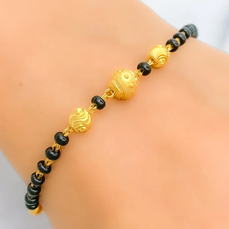 Women’s gemstone charm bracelet-Women’s silver stacking bracelets-Tasteful Black Bead 22k Gold Bracelet