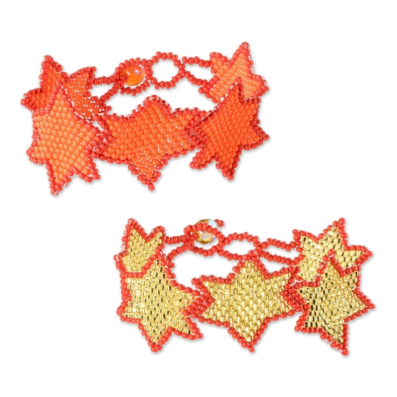 Women’s tennis bangle-Women’s luxury bracelets-Novica Handmade Star Duo In Orange Beaded Wristband Friendship Bracelets (Pair)